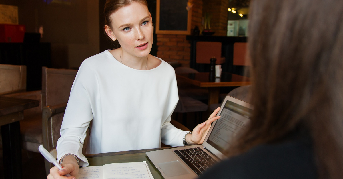 Women with laptop taking notes